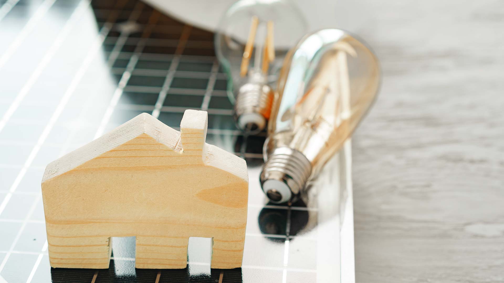 Wooden House Miniature And Solar Panel Close Up